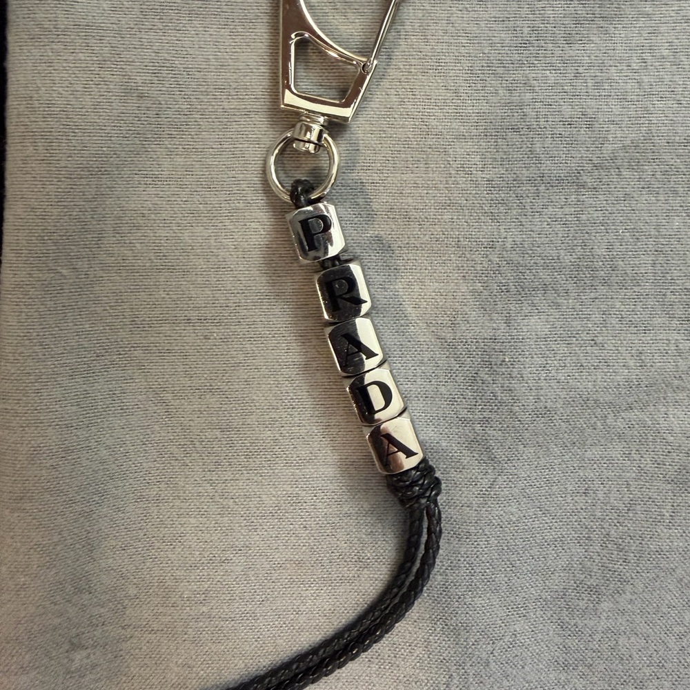 Prada Metallic and Black Letter Keychain